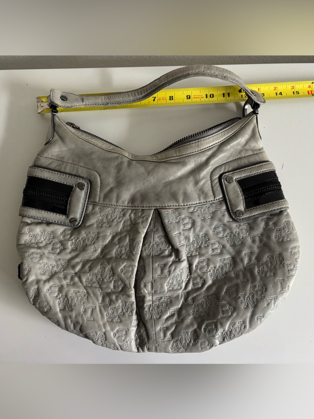 L.A.M.B. Embossed Logo Shoulder Bag in Light Gray with Black and Silver Accents